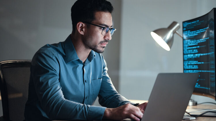 IT worker on computer